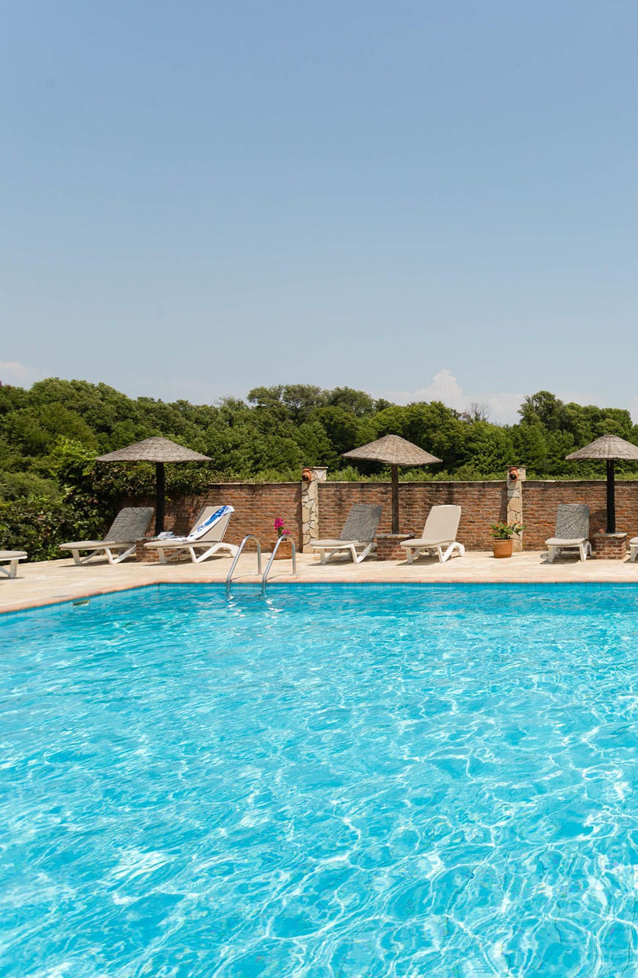 seasonal outdoor pool, free pool cabanas, pool umbrellas