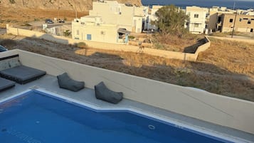 Outdoor pool, pool umbrellas, pool loungers