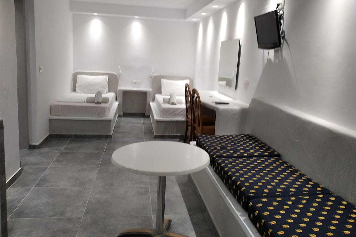 Classic Quadruple Room, Patio | In-room safe, soundproofing, bed sheets