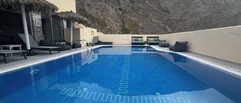 Outdoor pool, pool umbrellas, pool loungers