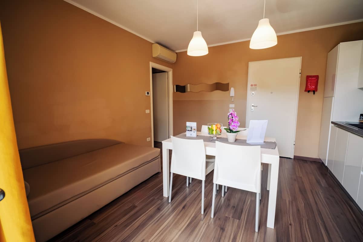 Economy Apartment | Living area | 32-inch LCD TV with digital channels, TV, heated floors