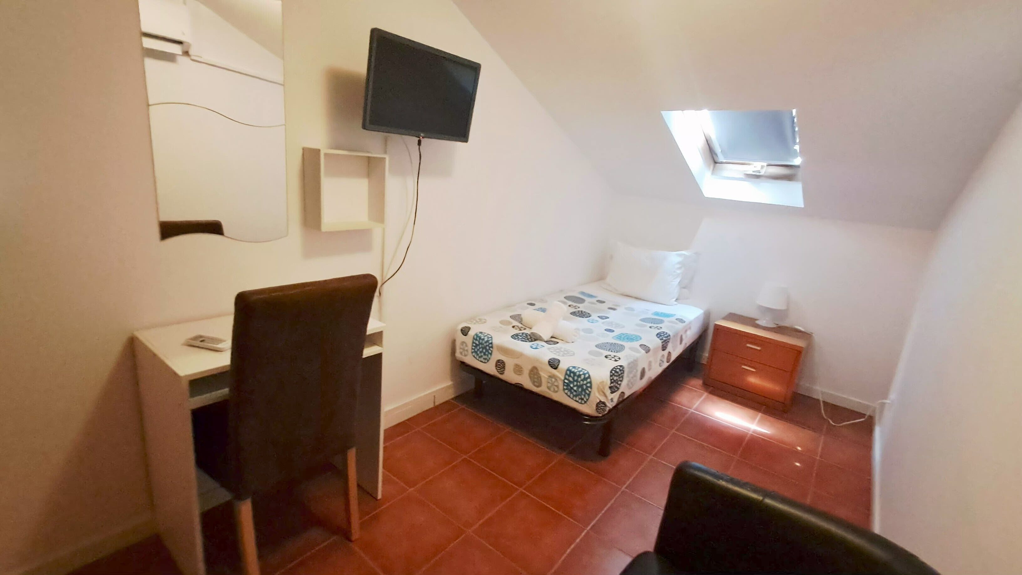Single Room Shared Bathroom
