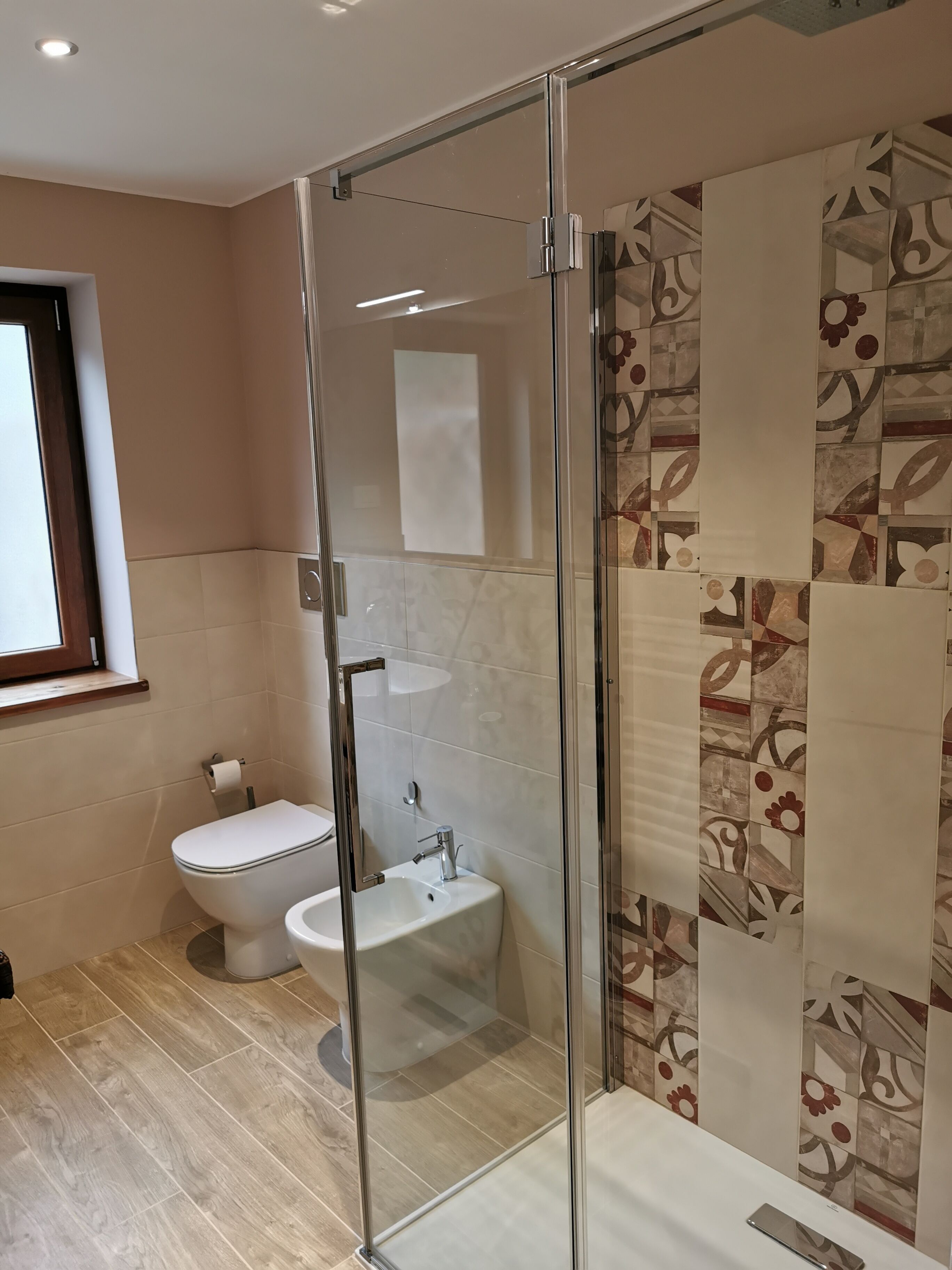 deluxe apartment | bathroom | shower, hair dryer, towels