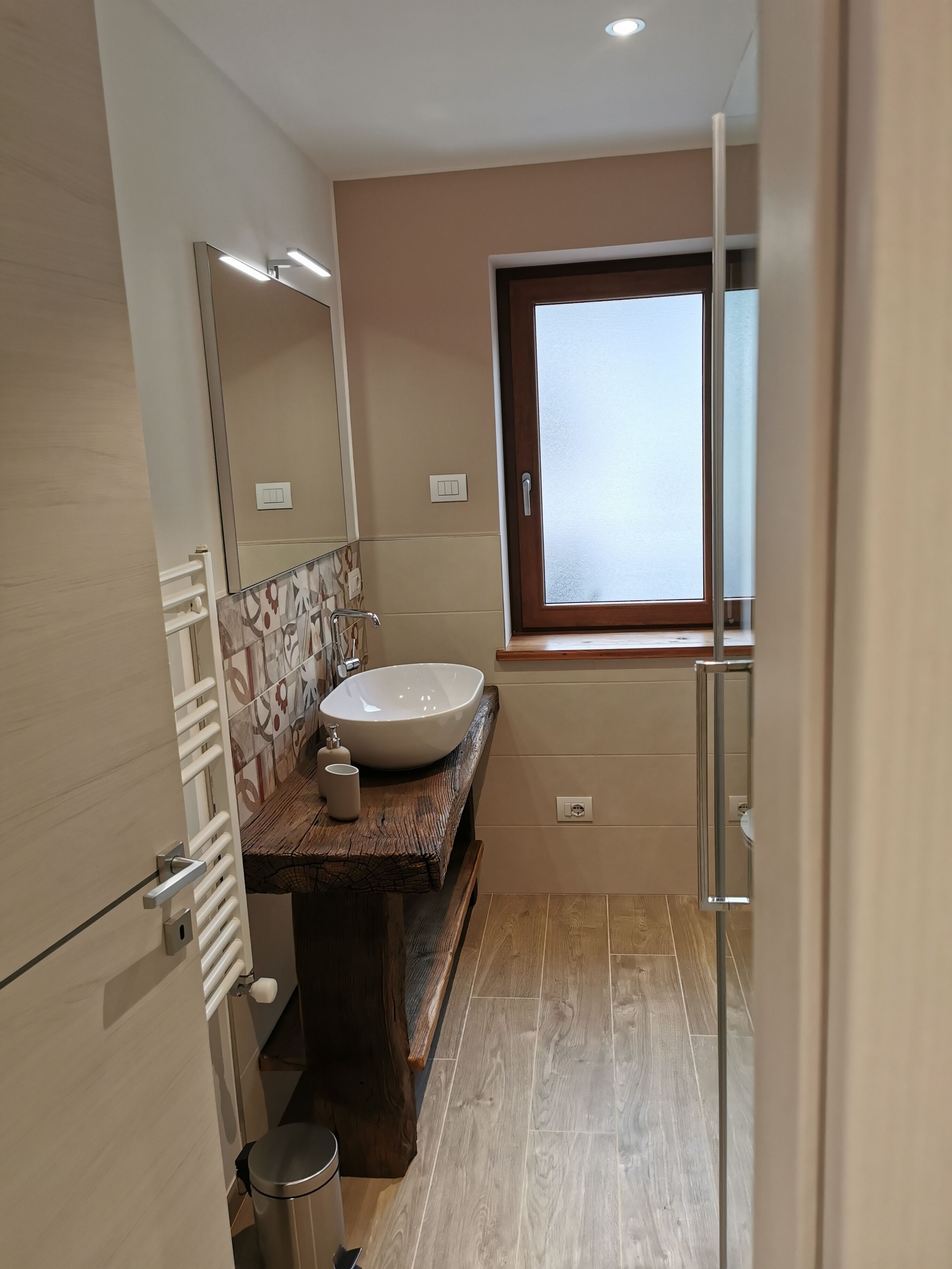 deluxe apartment | bathroom | shower, hair dryer, towels