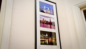 A framed collage of three cityscapes on a wall. - Leigh House Hotel (London)
