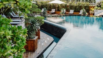 Indoor pool, seasonal outdoor pool, pool umbrellas, pool loungers