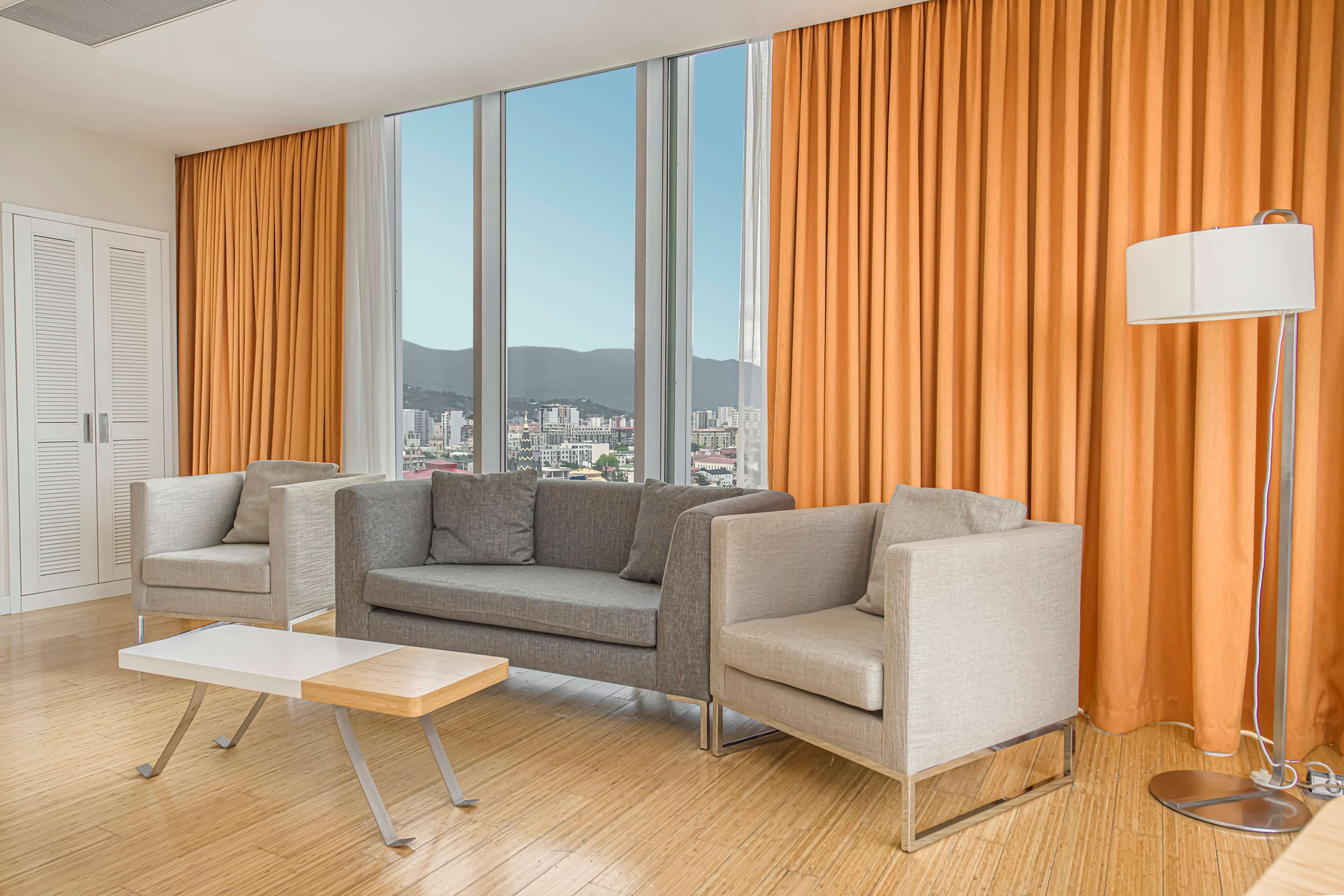 family suite, sea view | minibar, in-room safe, desk, laptop workspace