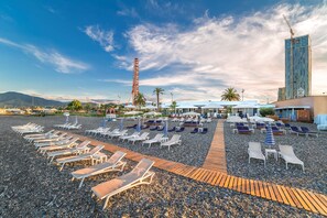 Free beach shuttle, beach cabanas, sun loungers, beach umbrellas