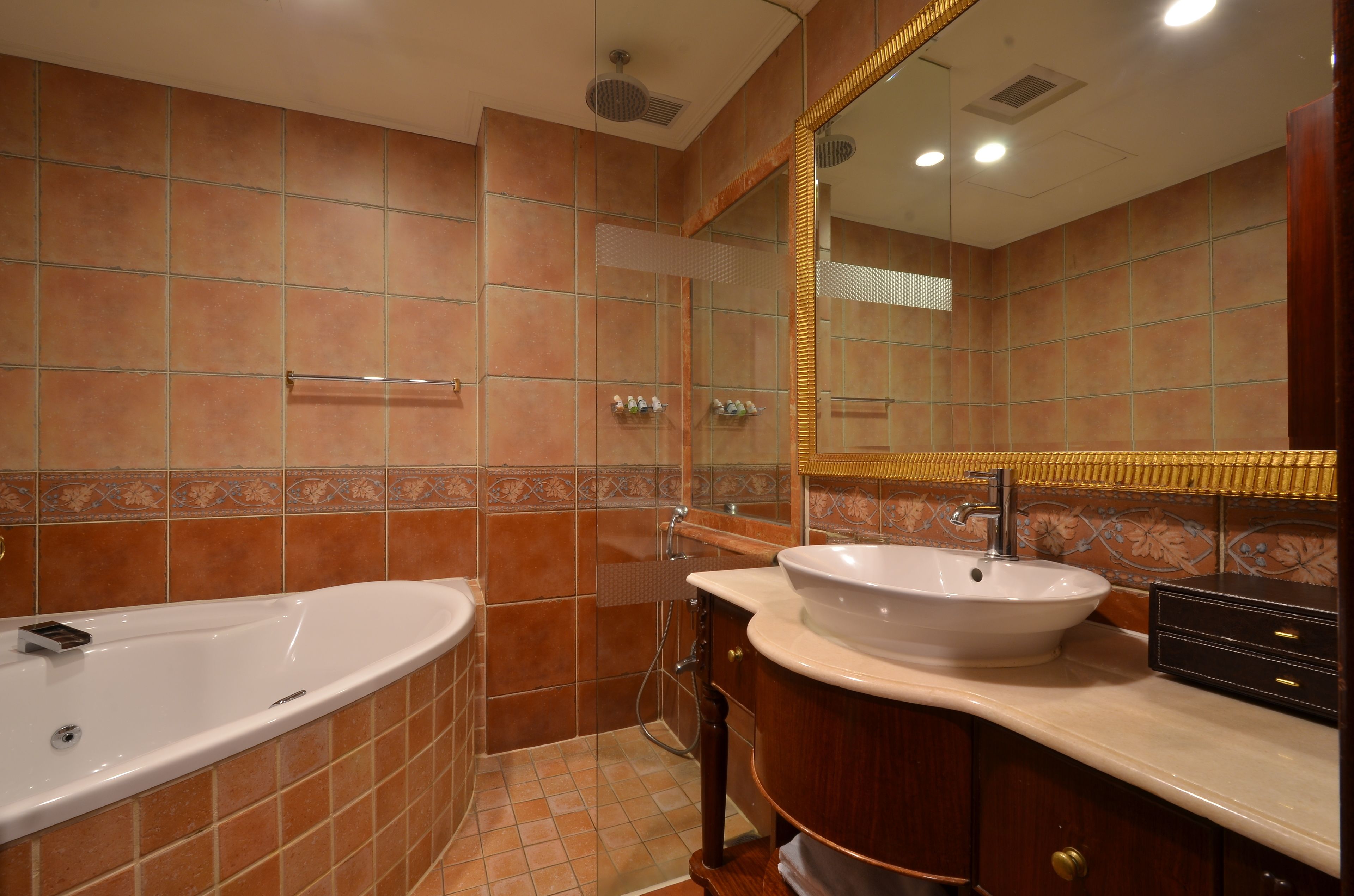 separate bathtub and shower, jetted bath, rainfall showerhead