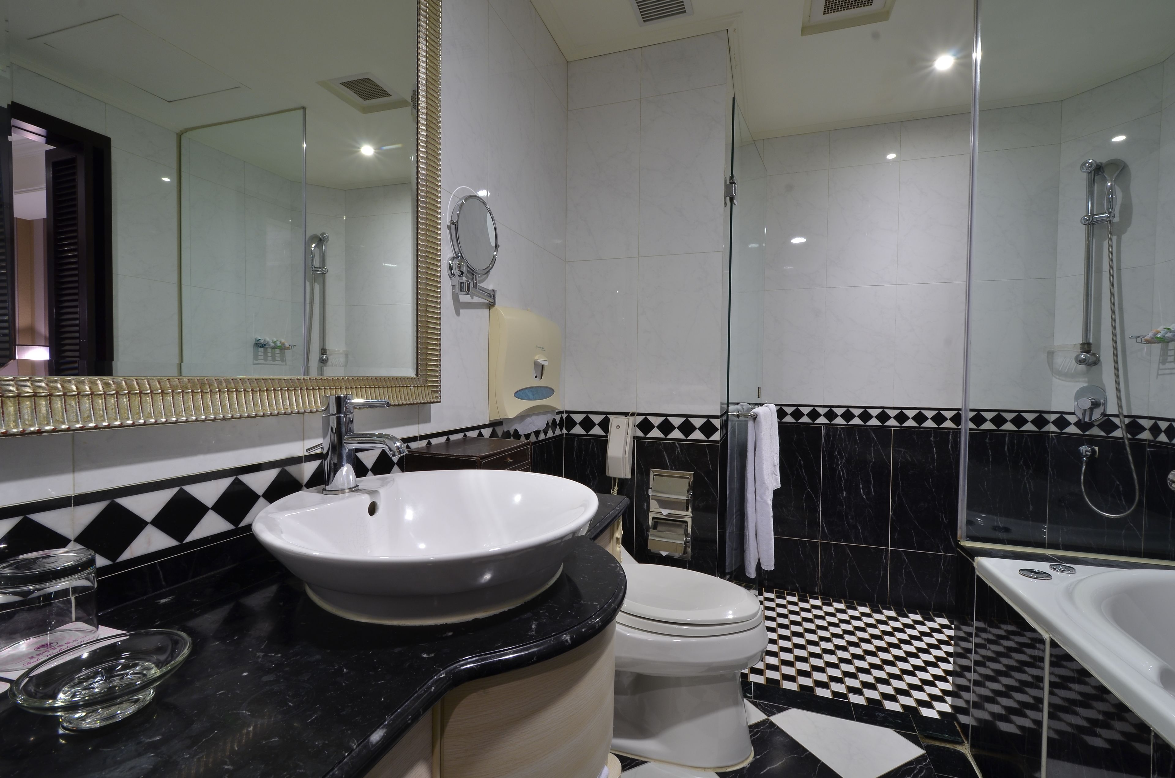 separate bathtub and shower, jetted bath, rainfall showerhead