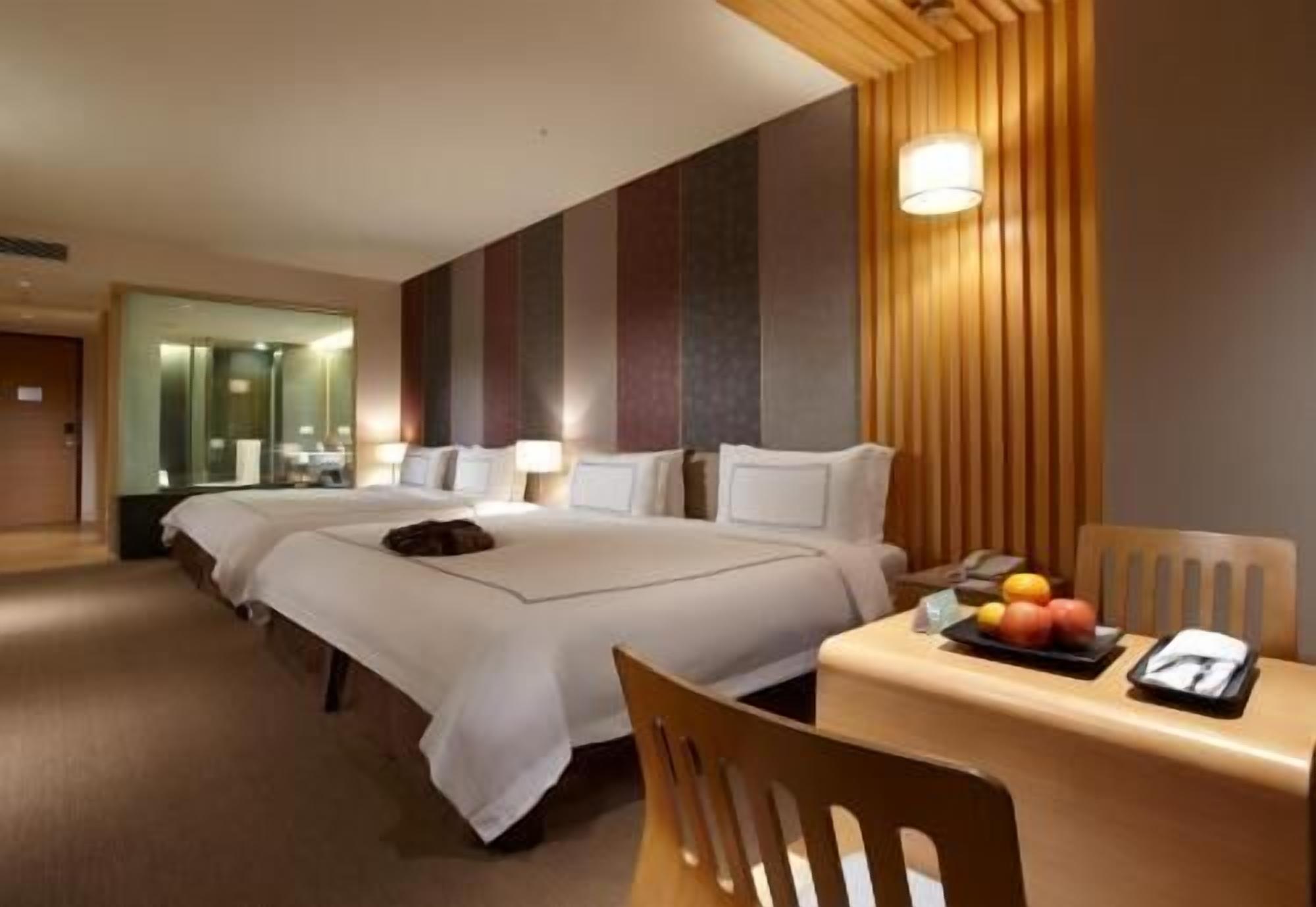 Premium bedding, down comforters, minibar, in-room safe