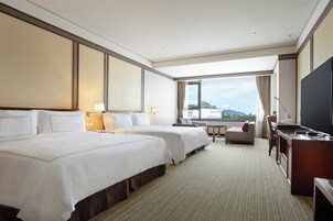 Deluxe Family Room | Premium bedding, down comforters, minibar, in-room safe