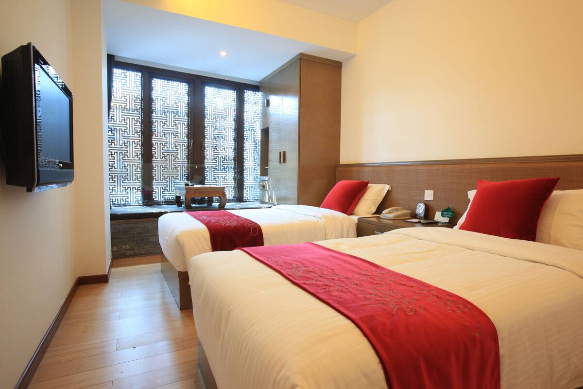 Premium bedding, memory-foam beds, in-room safe, blackout curtains