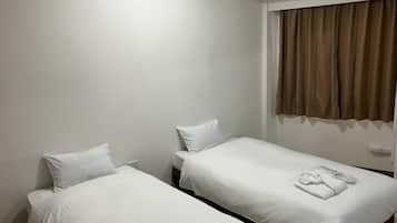 Desk, blackout curtains, free WiFi, bed sheets