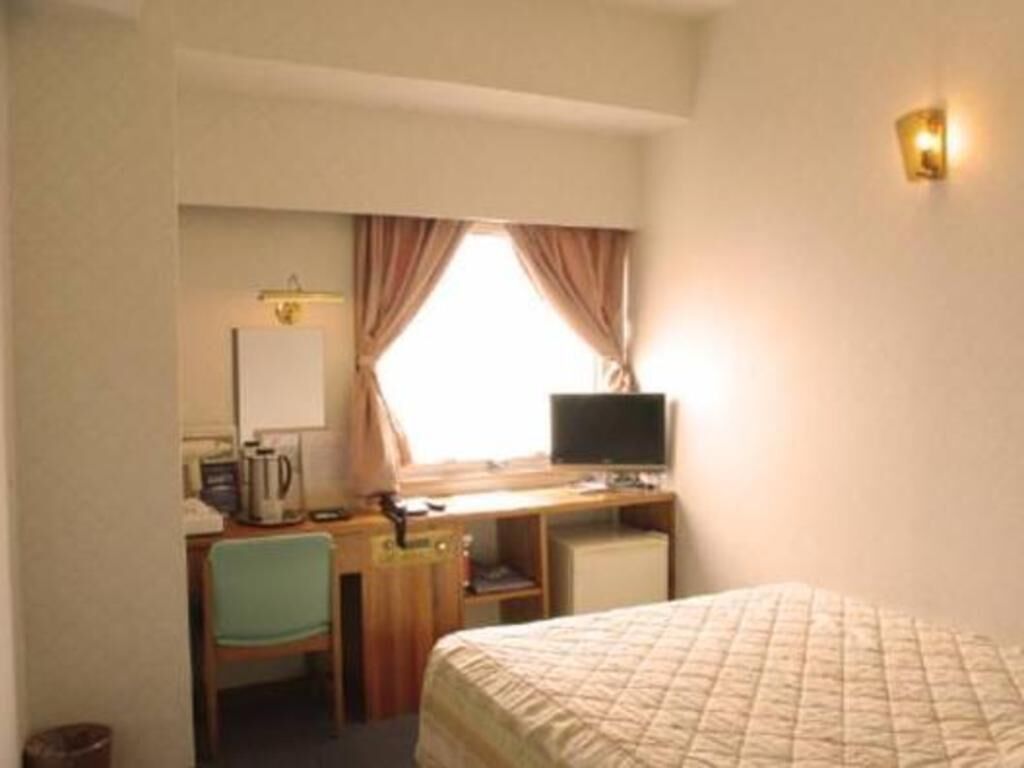 Desk, blackout drapes, free WiFi, bed sheets