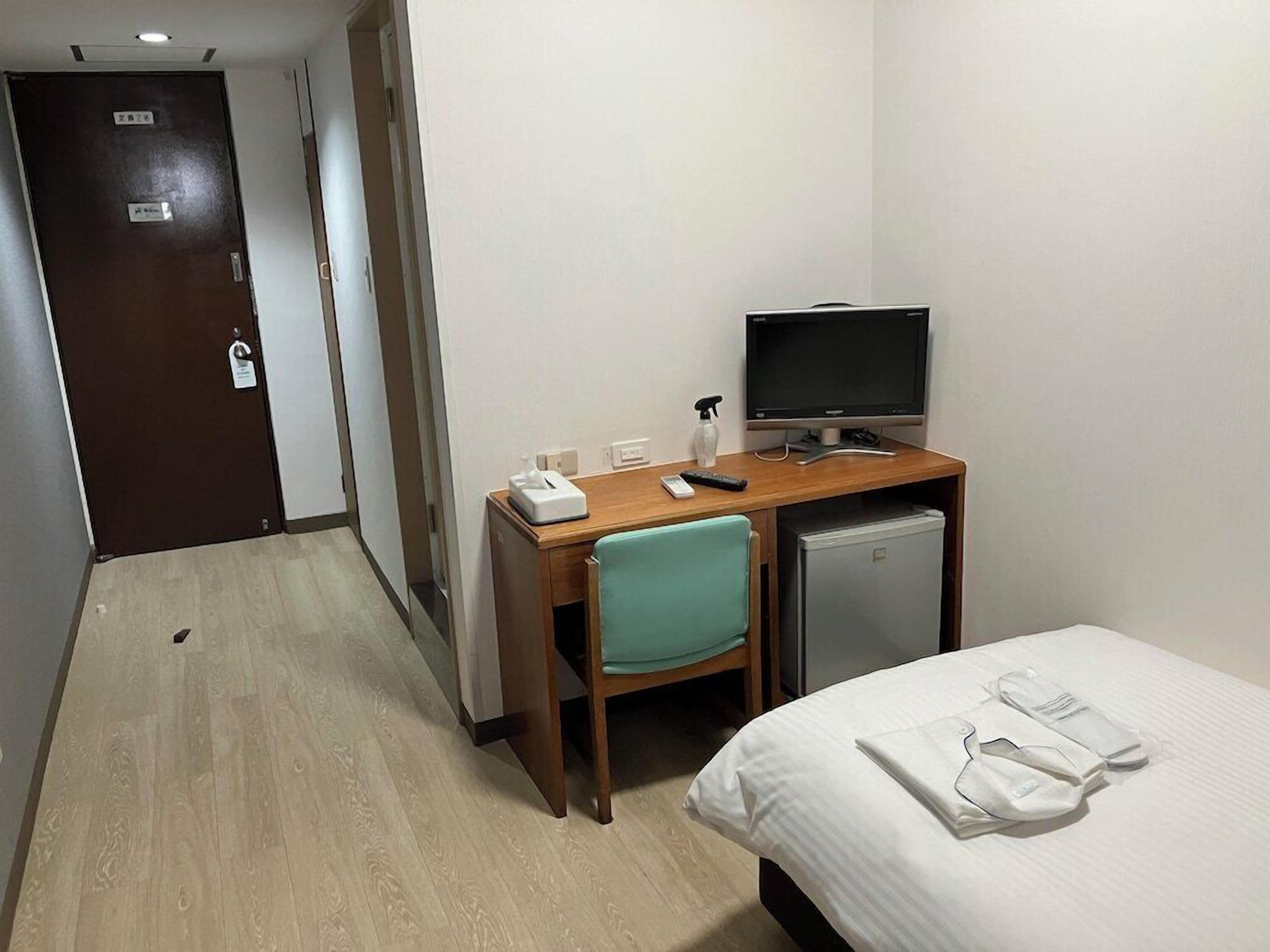 Desk, blackout curtains, free WiFi, bed sheets