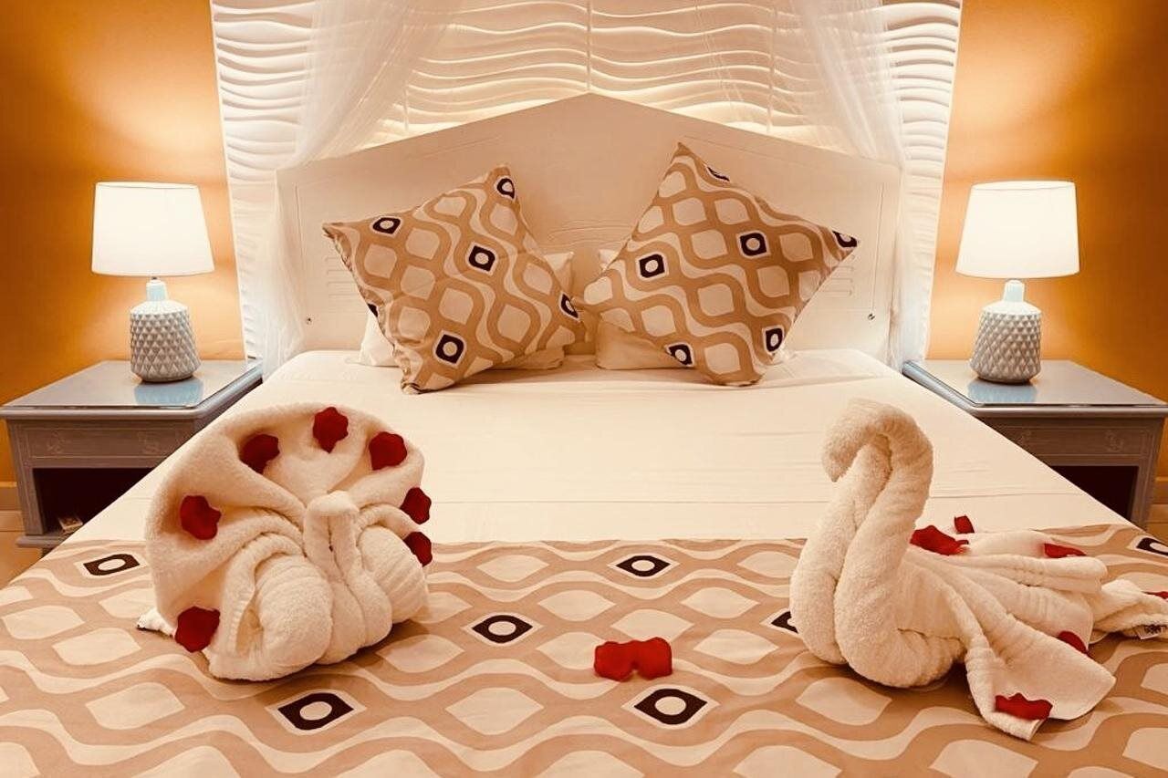 Premium bedding, desk, blackout curtains, soundproofing