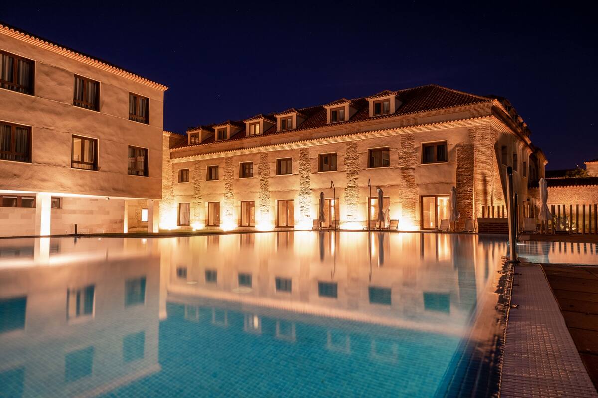 indoor pool, seasonal outdoor pool, pool umbrellas, pool loungers