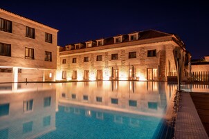 Indoor pool, seasonal outdoor pool, pool umbrellas, sun loungers