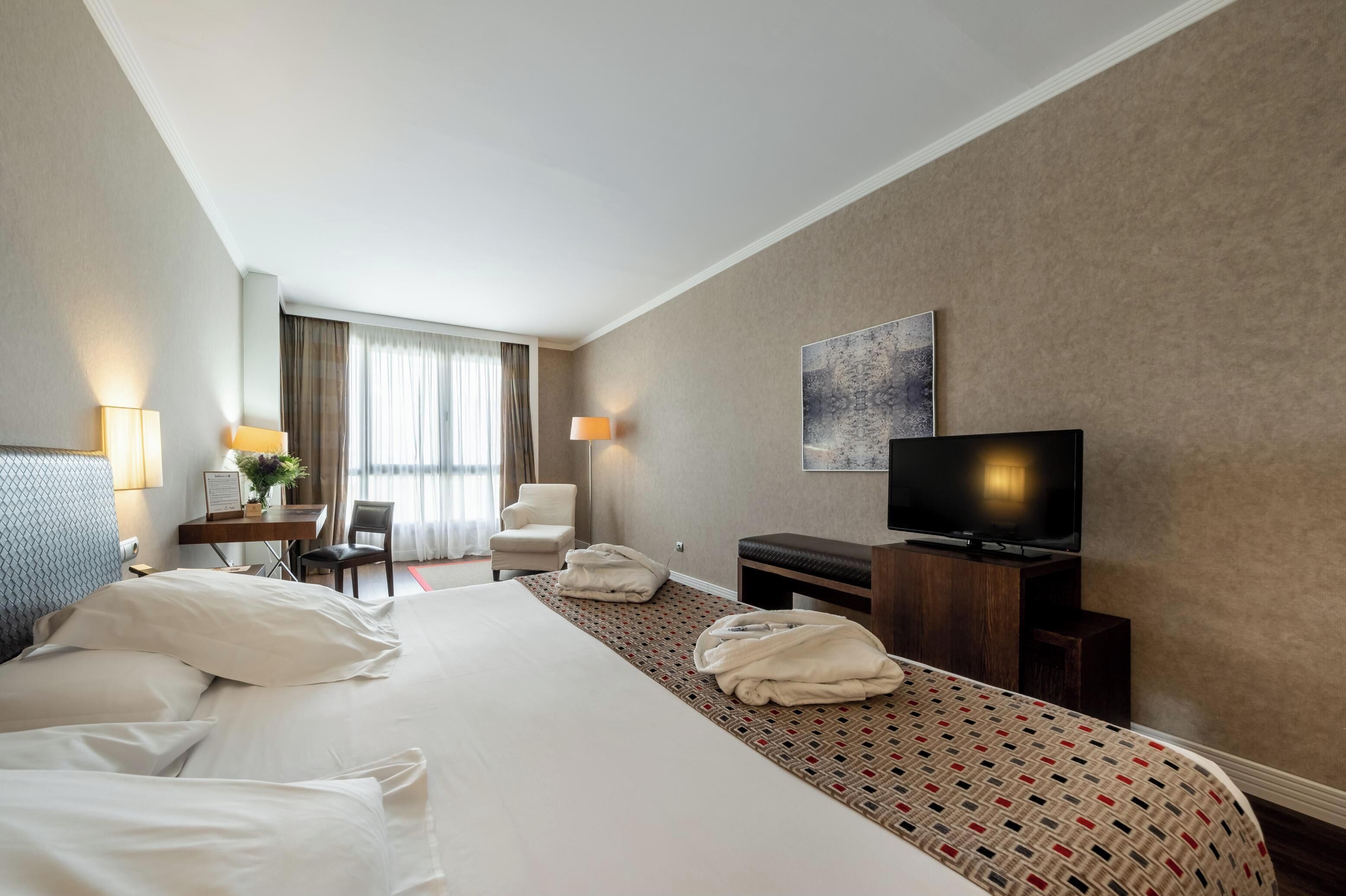 frette italian sheets, premium bedding, down duvets, minibar