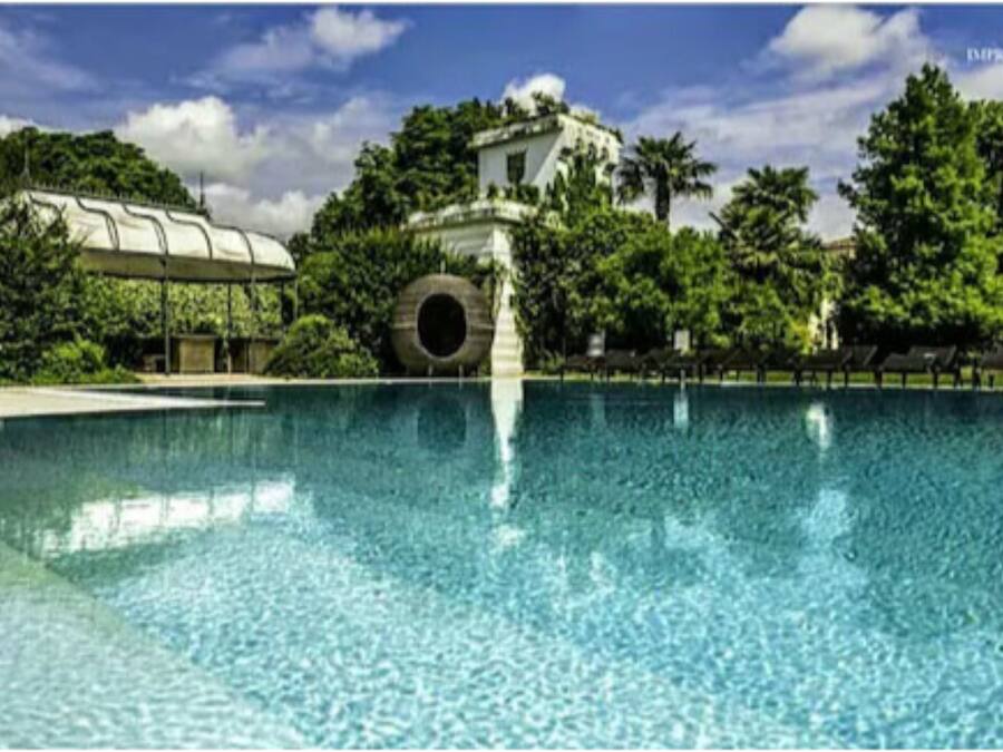 Seasonal outdoor pool, pool umbrellas, pool loungers