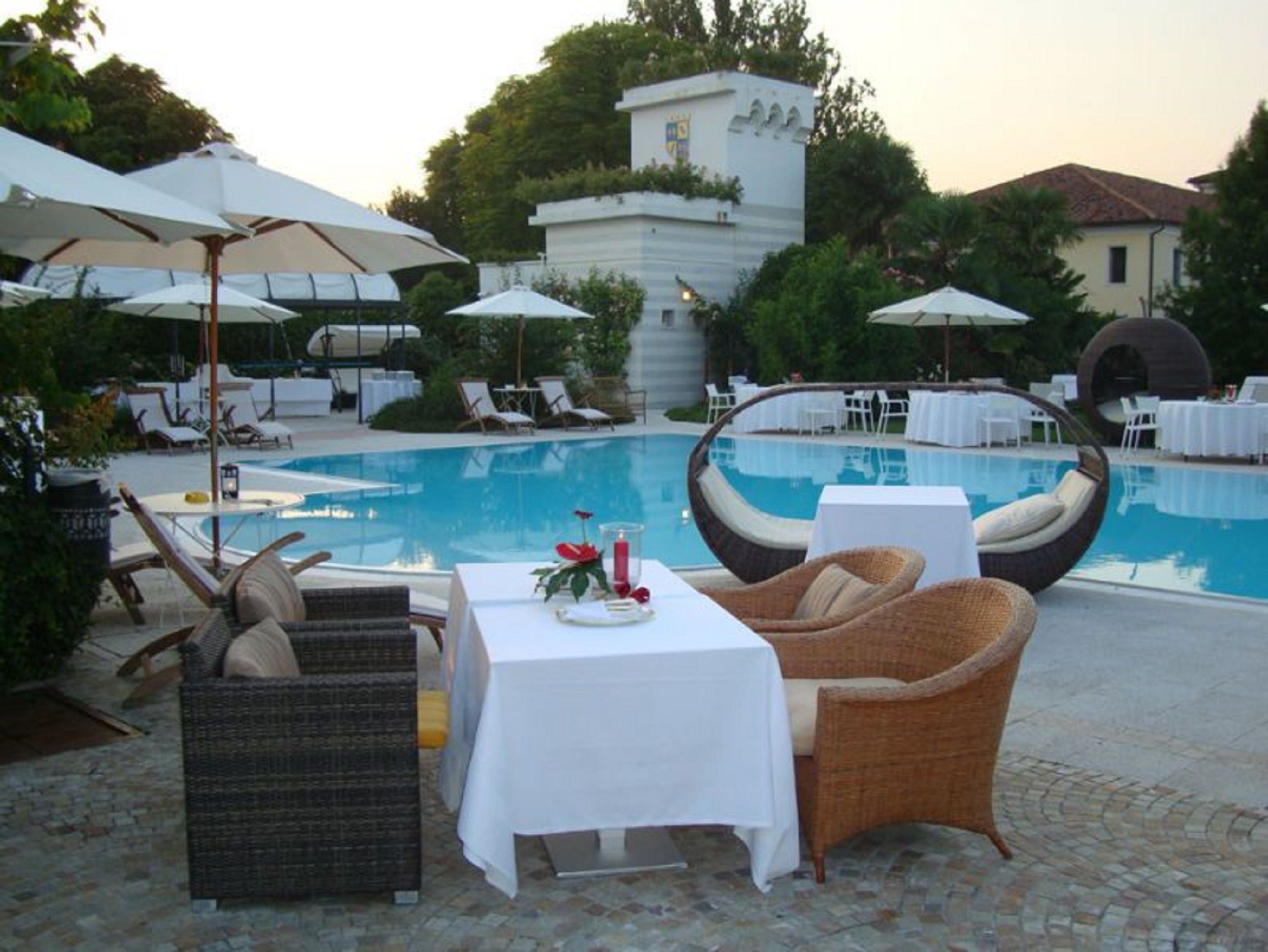 seasonal outdoor pool, pool umbrellas, pool loungers