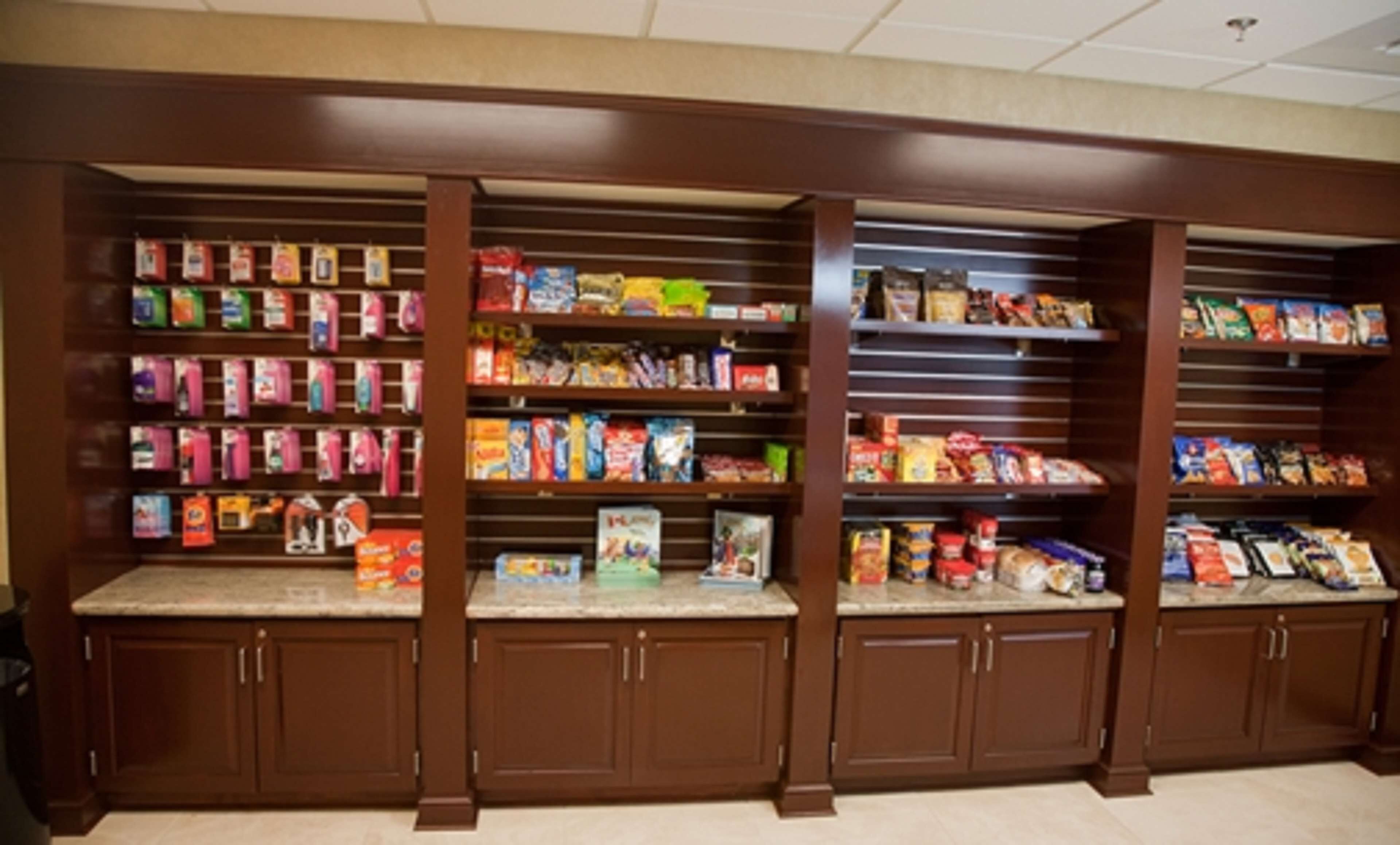 A store with multiple shelves stocked with various products.