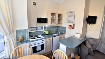 Apartamento familiar, baño privado (Large Bedroom First Floor) | Cocina compartida