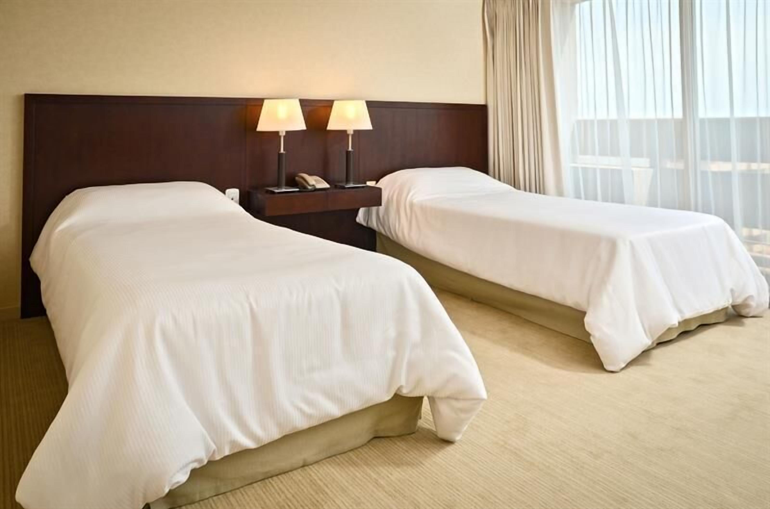 Premium bedding, down duvets, pillow-top beds, minibar