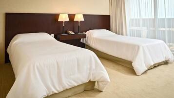Premium bedding, down duvets, pillow-top beds, minibar