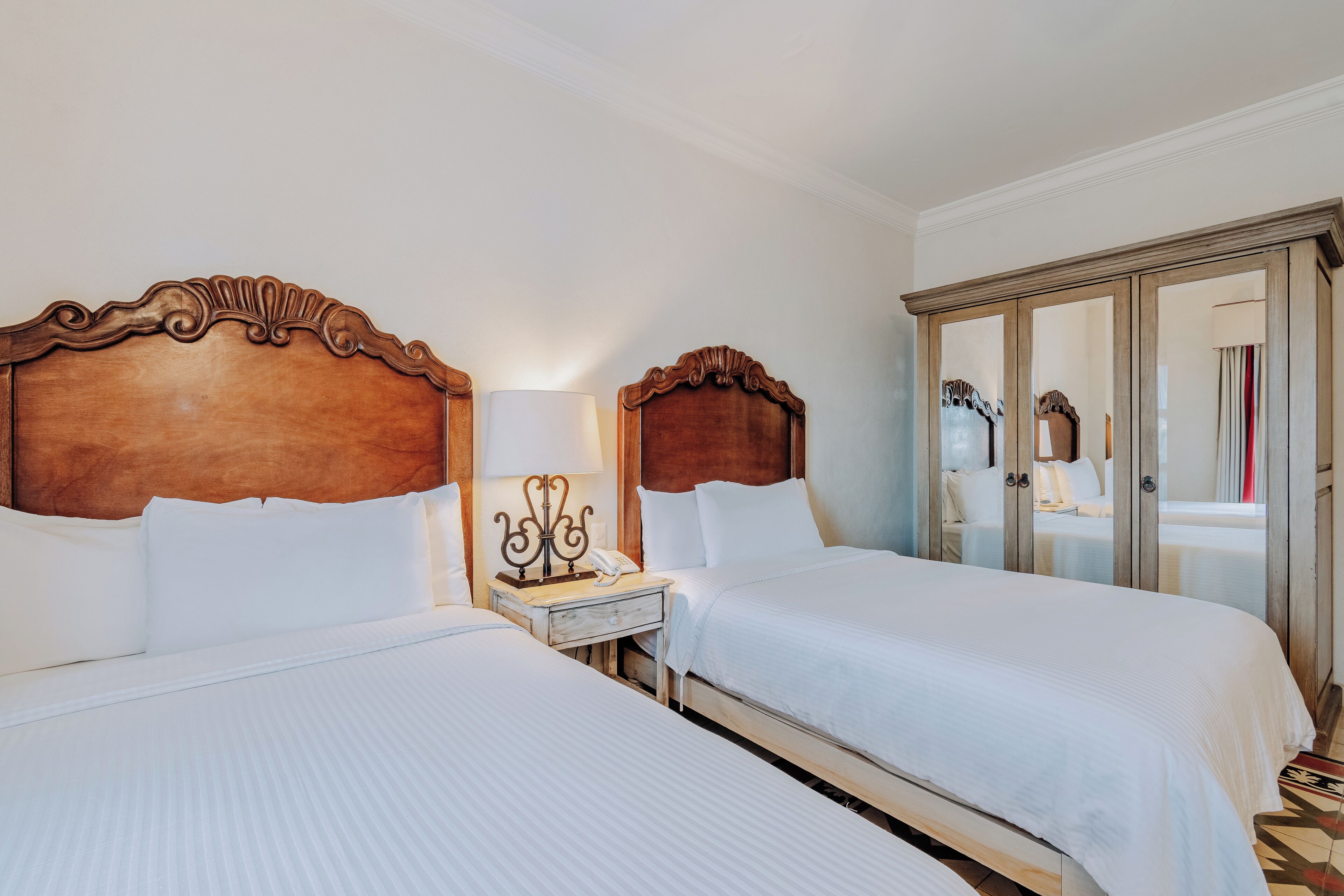 standard double room, 2 double beds | 1 bedroom, in-room safe, blackout curtains, iron/ironing board