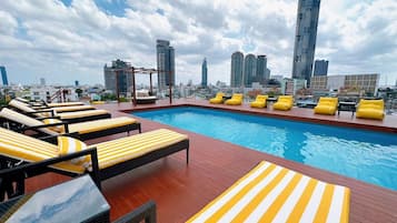 Outdoor pool, open 8:00 AM to 8:00 PM, free pool cabanas, pool loungers