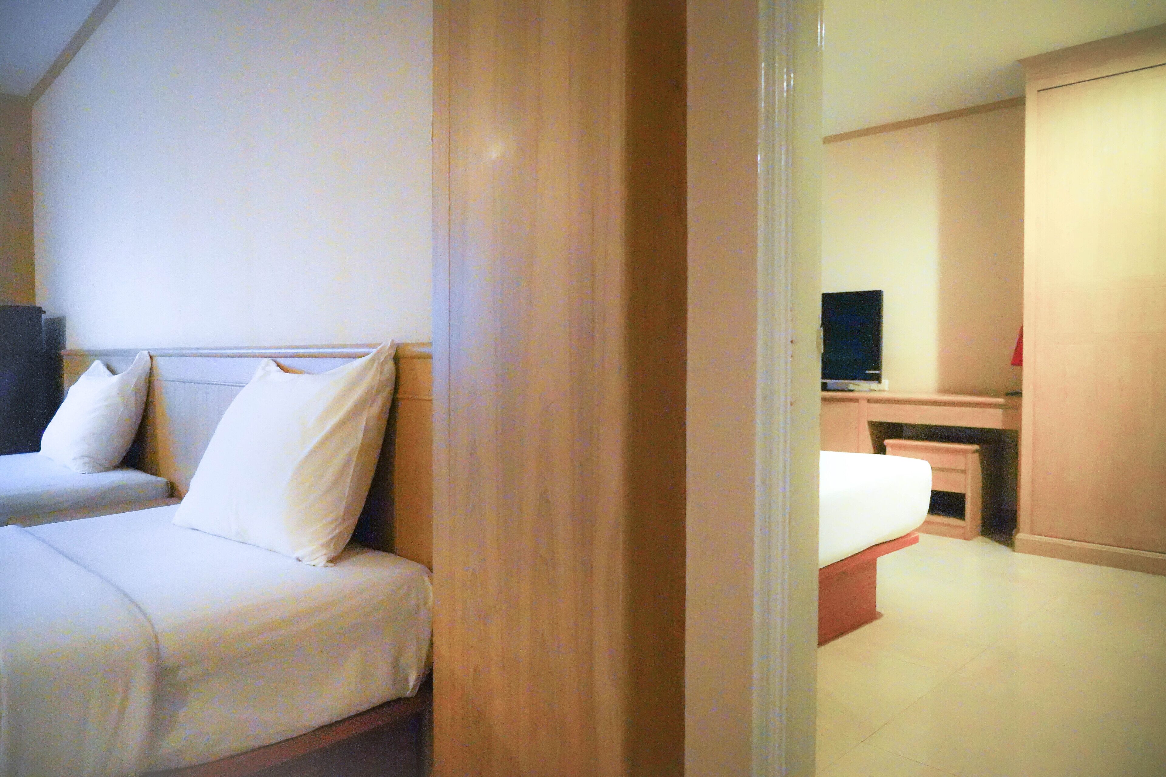 Suite | Cortinas opacas, camas supletorias, wifi gratis y ropa de cama