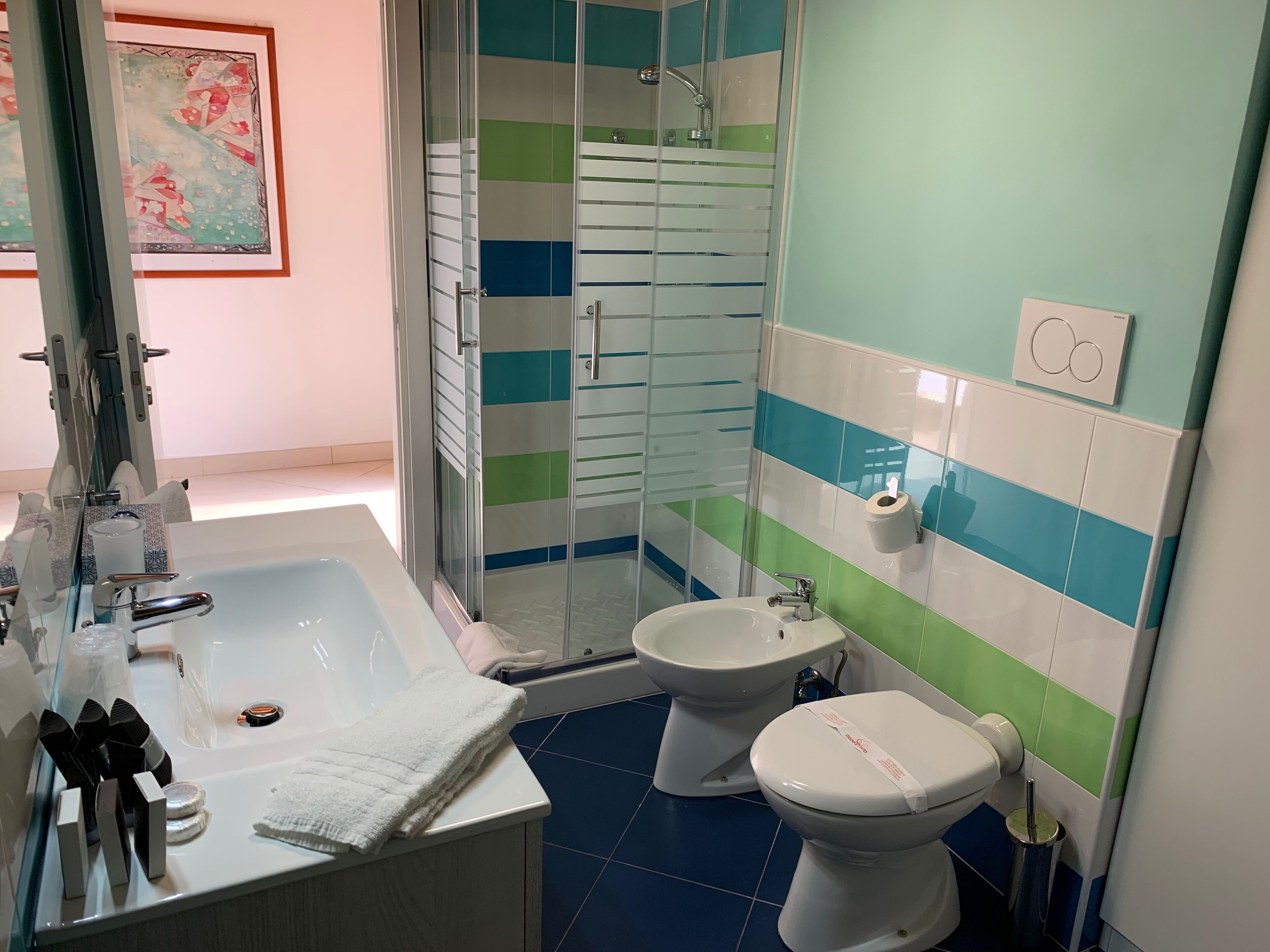 deluxe studio, 1 double bed with sofa bed | bathroom | shower, free toiletries, hair dryer, bidet