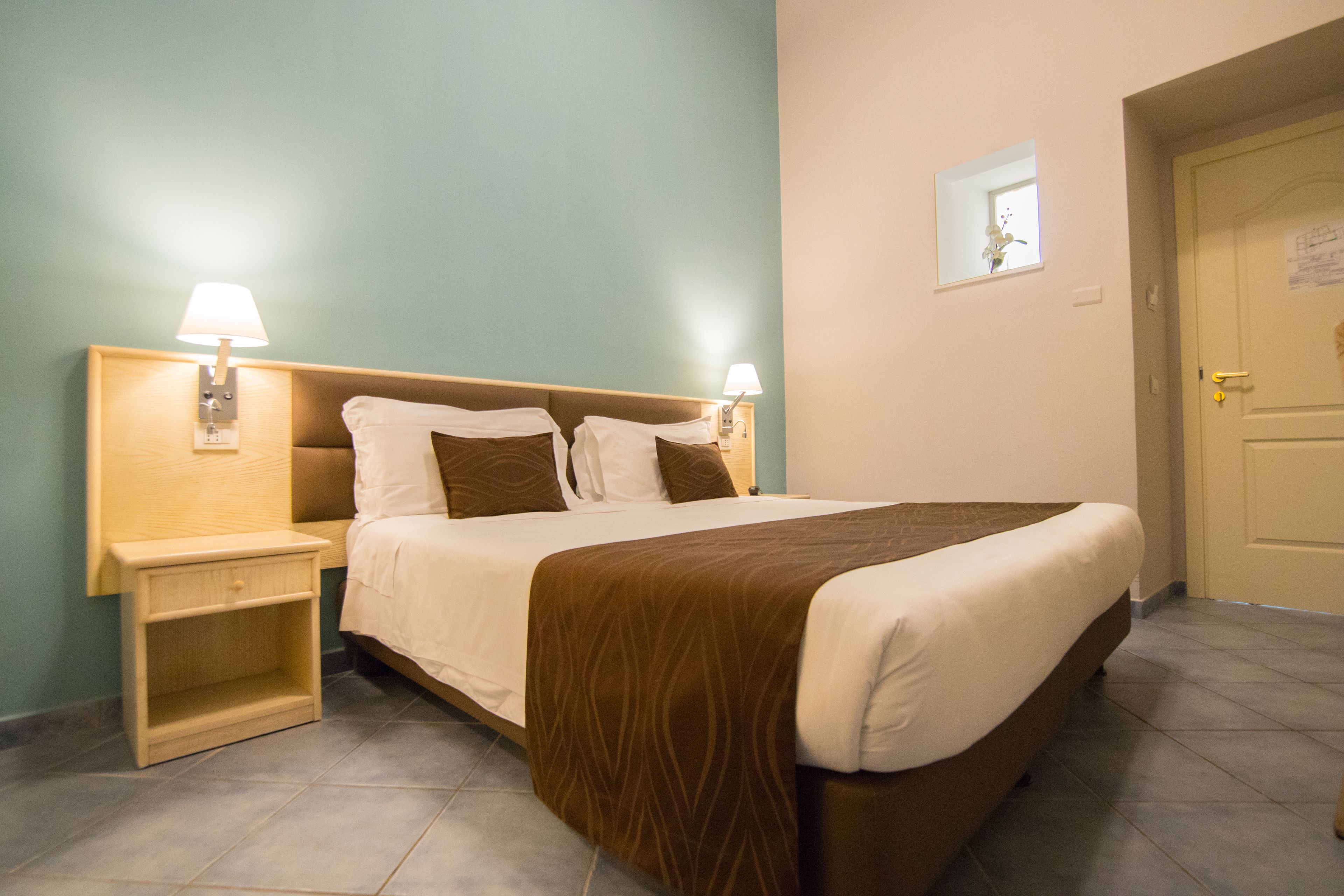 economy double room, no windows | 1 bedroom, premium bedding, minibar, in-room safe