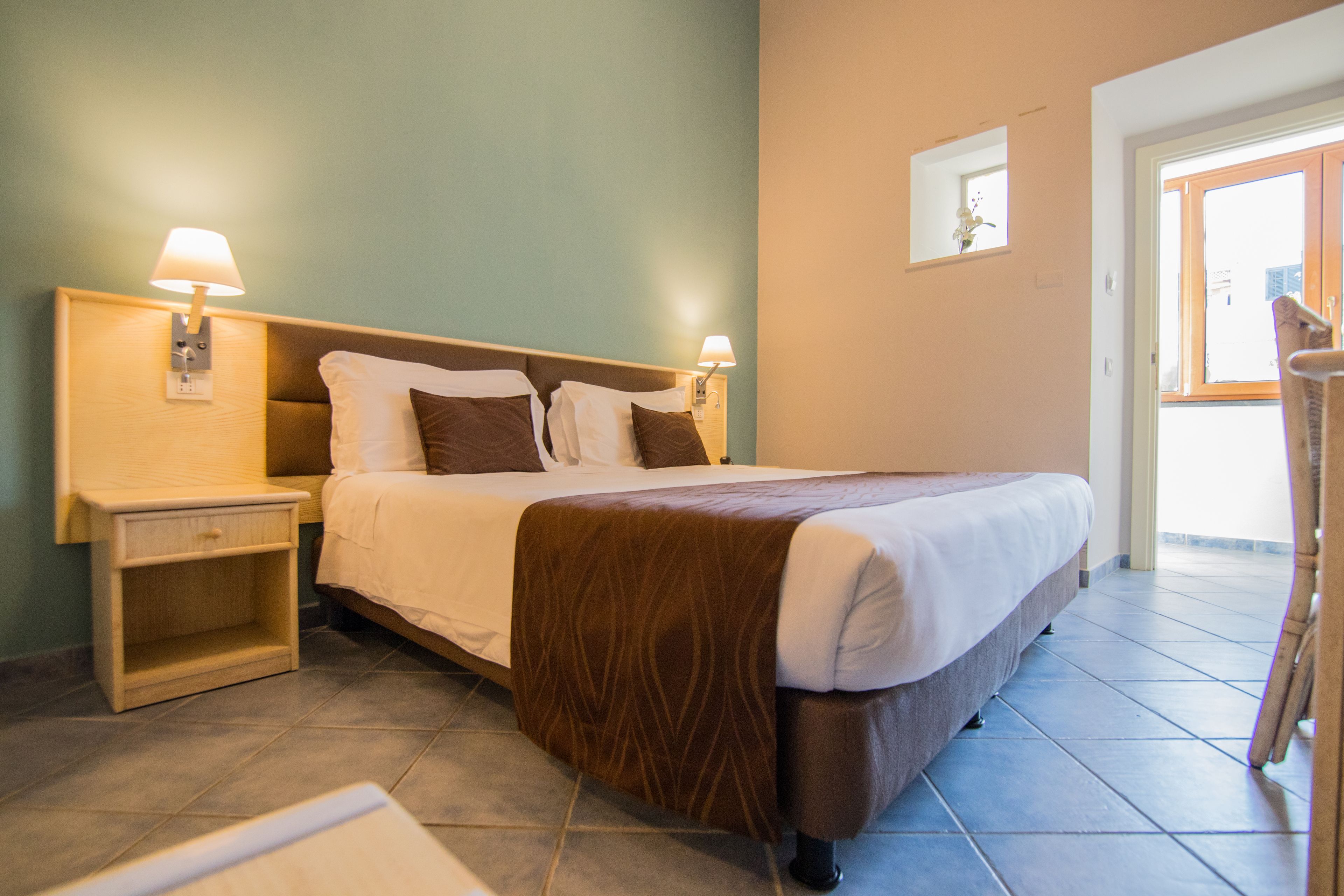 economy double room, no windows | 1 bedroom, premium bedding, minibar, in-room safe