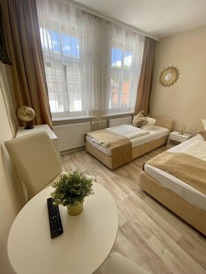 Desk, free WiFi, bed sheets