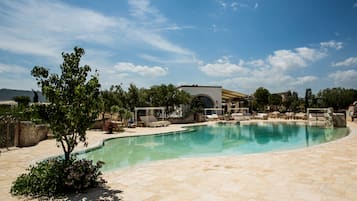 Seasonal outdoor pool, open 10:30 AM to 9:00 PM, pool umbrellas