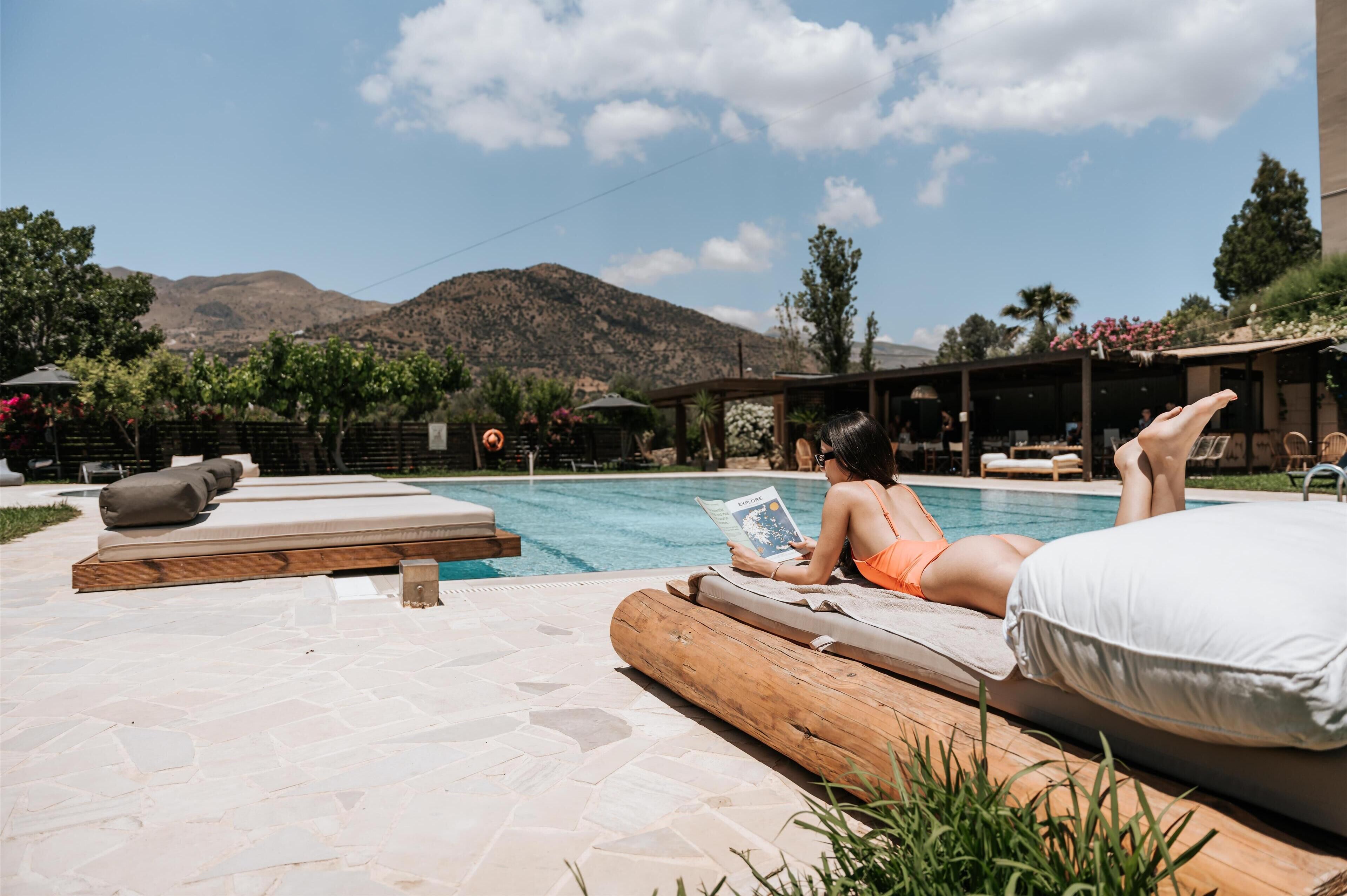 Seasonal outdoor pool, pool umbrellas, sun loungers