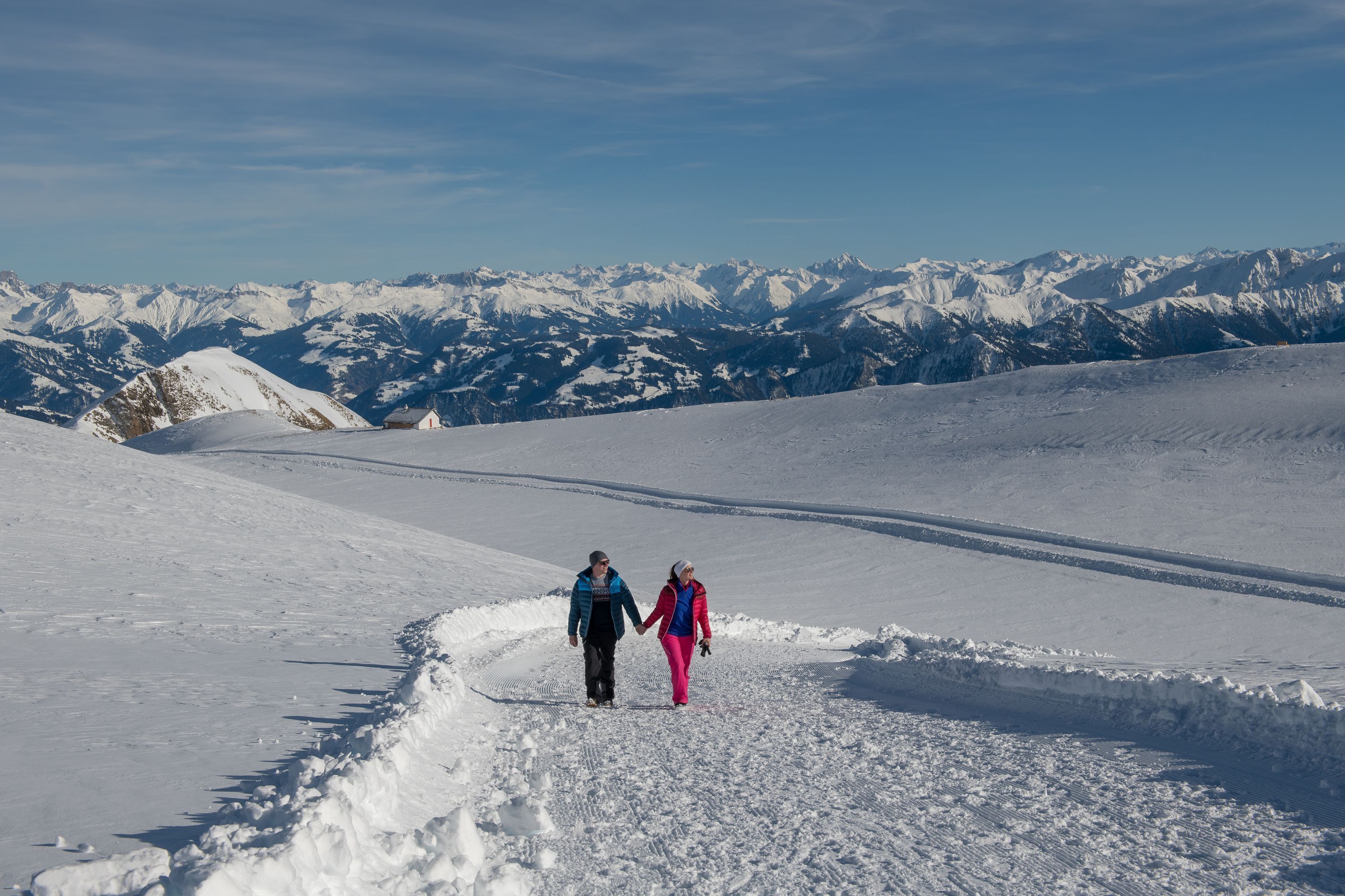 A snowy mountain landscape with a clear sky.