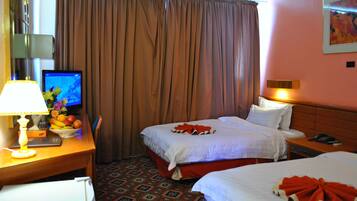 Double or Twin Room | Minibar, in-room safe, desk, blackout drapes