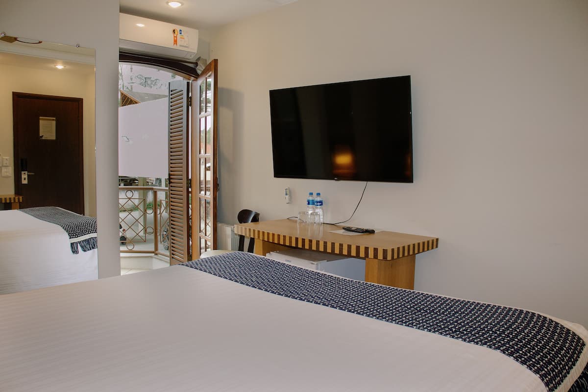 Luxe suite | Luxe beddengoed, een minibar, een kluis op de kamer, babybedden