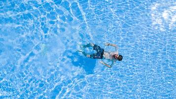 Outdoor pool, pool umbrellas, pool loungers