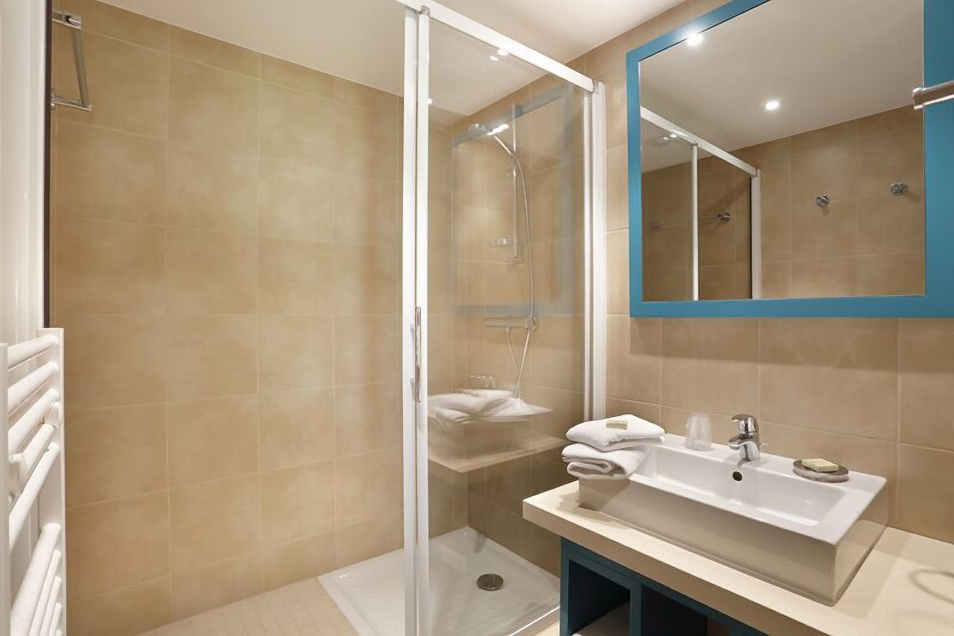 family duplex room  | bathroom | hair dryer, towels