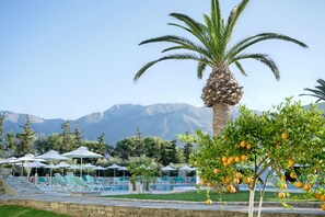 2 outdoor pools, pool umbrellas, pool loungers