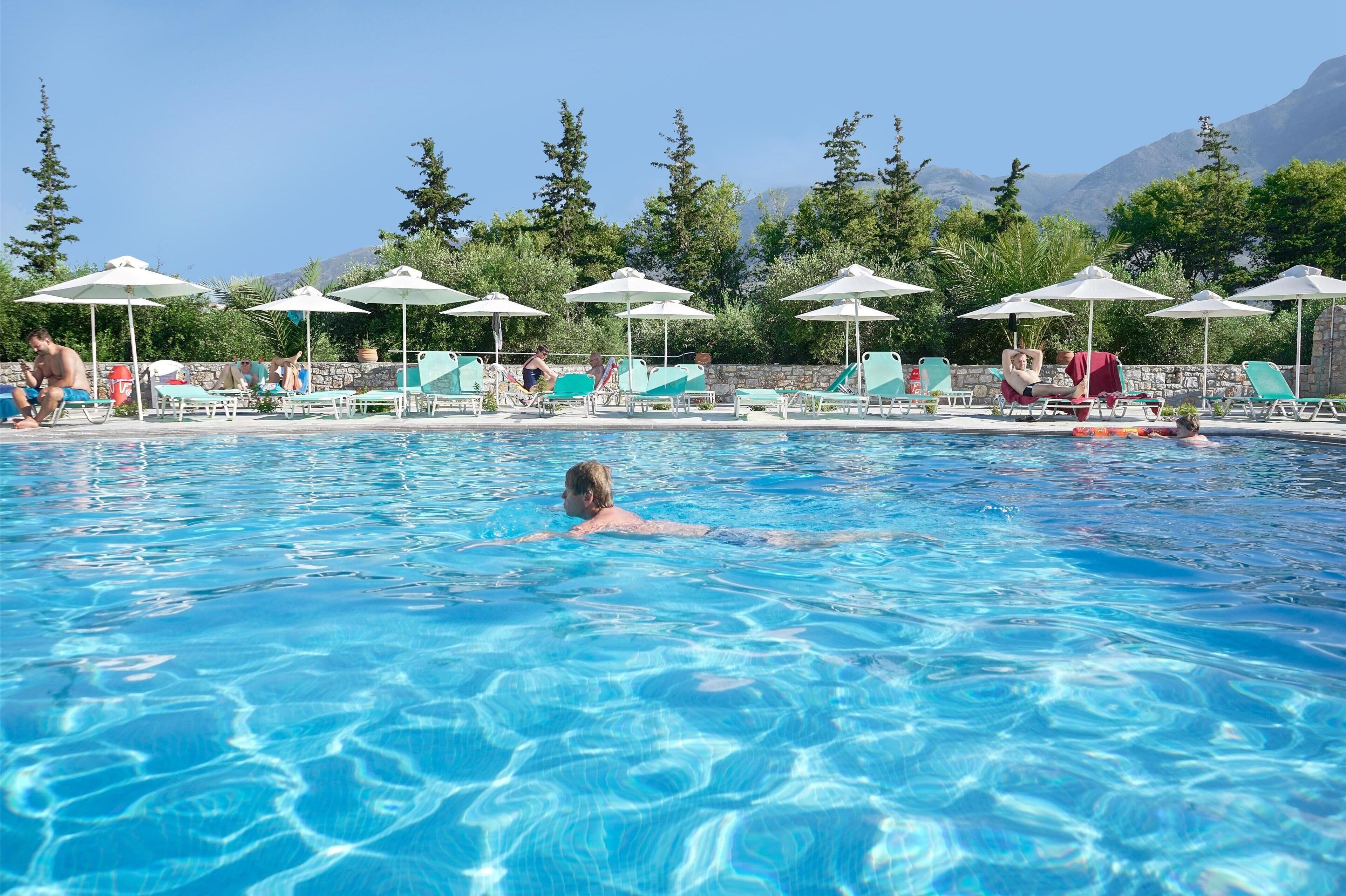 2 outdoor pools, pool umbrellas, pool loungers