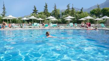 2 outdoor pools, pool umbrellas, pool loungers