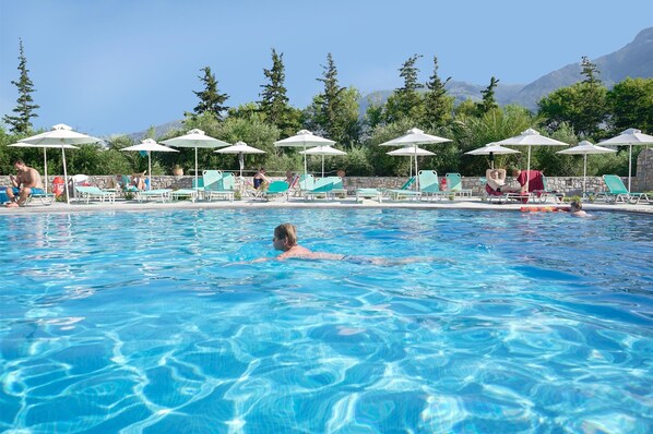 2 outdoor pools, pool umbrellas, pool loungers