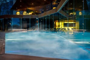 Indoor pool, outdoor pool, pool umbrellas, sun loungers