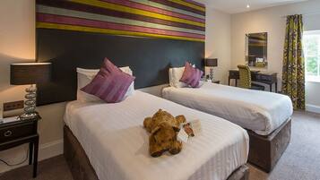 Premium bedding, desk, iron/ironing board, rollaway beds